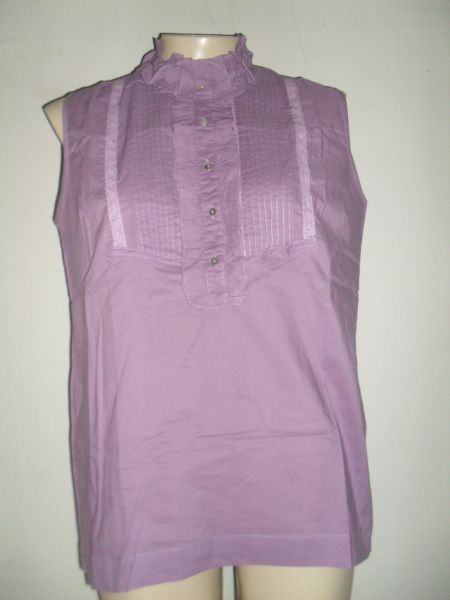 BLUSA PLANA C/ BOLSOS FRENTE E PREGAS.
